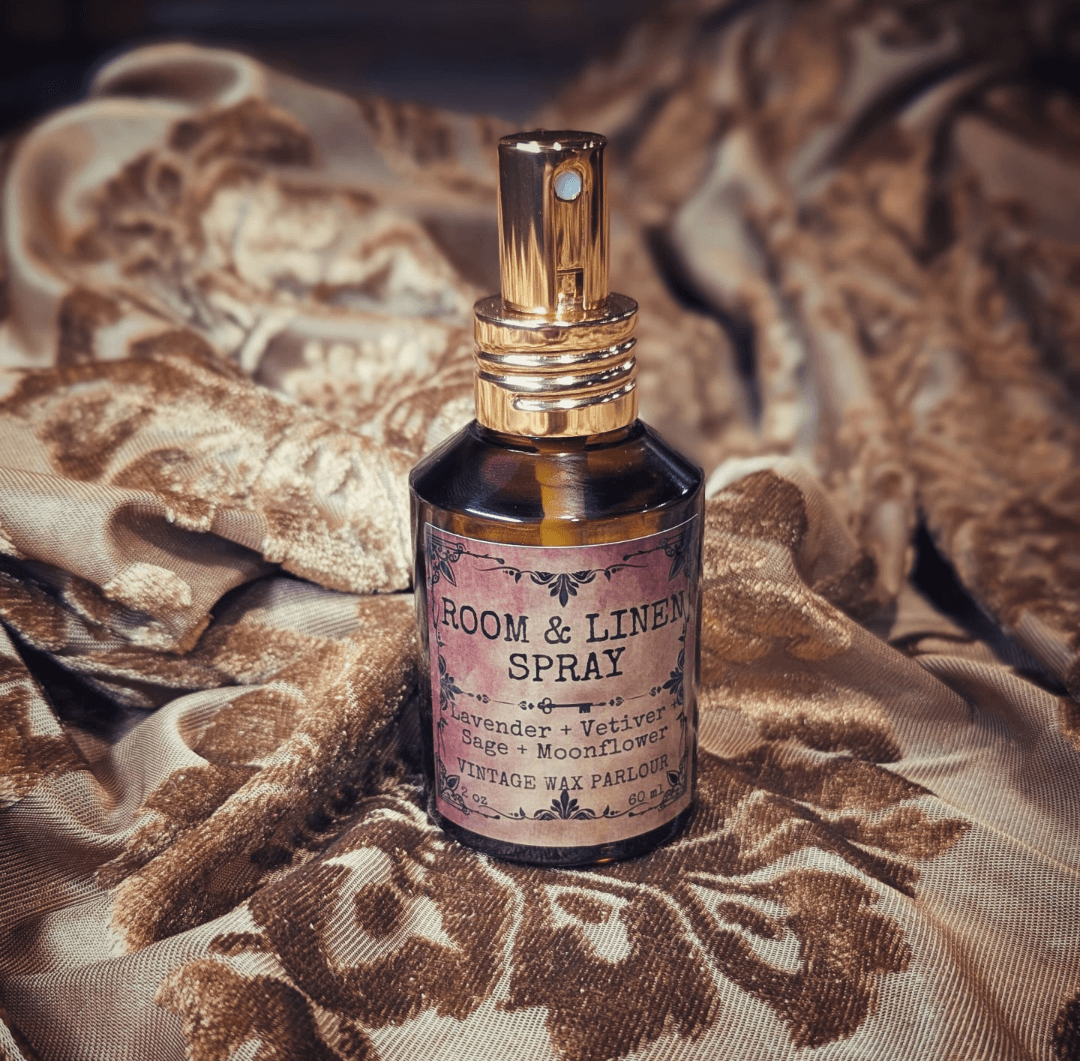 Room & Linen Spray bottle on vintage fabric, featuring lavender and vetiver scent, perfect for vintage home decor.