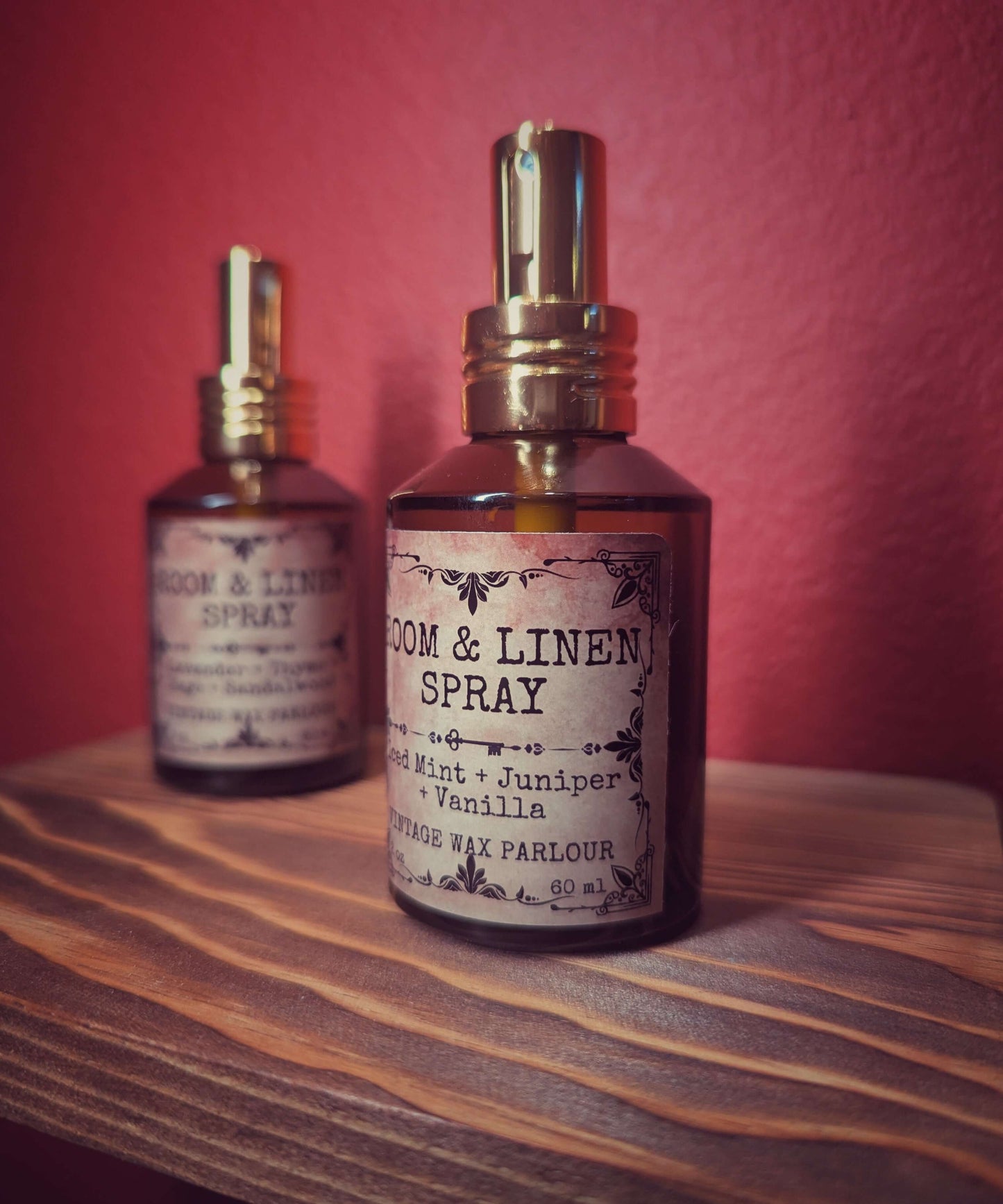 Room & Linen Spray bottles in vintage packaging on a wooden shelf, perfect for vintage home decor and fresh scents.